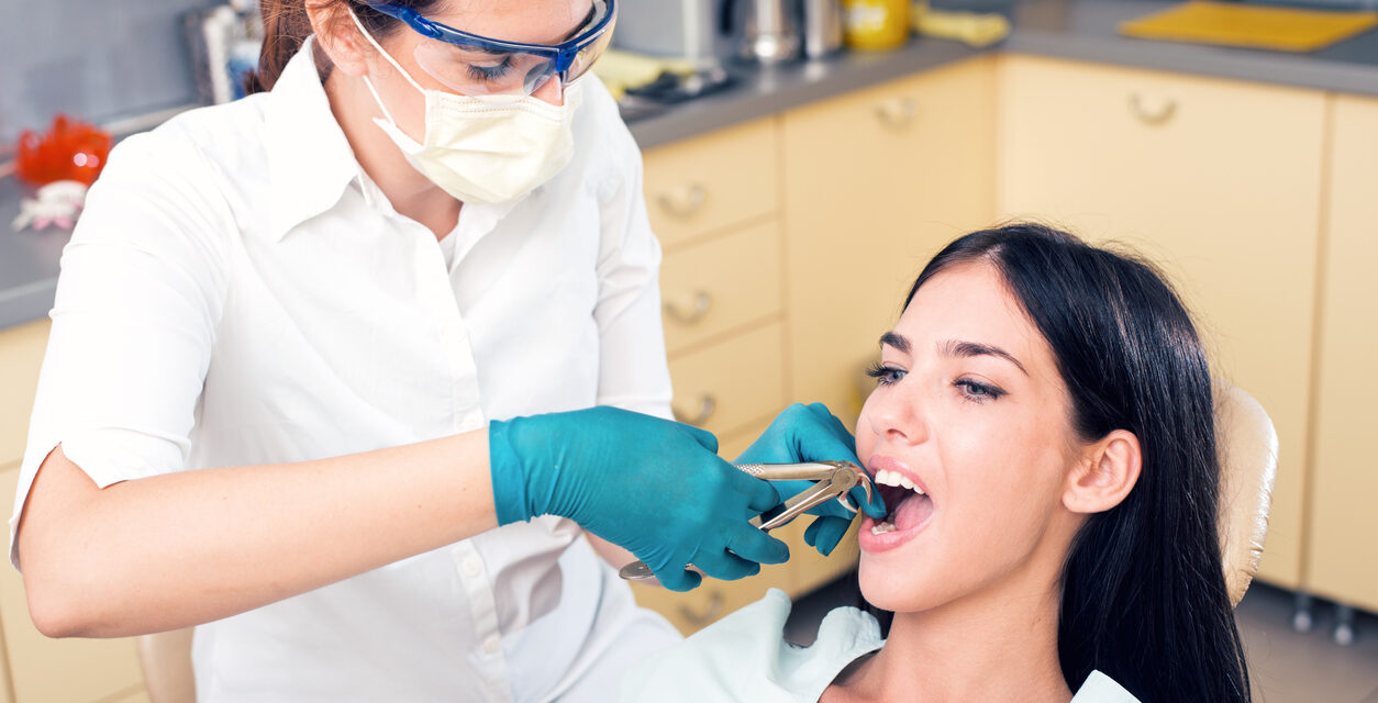 https://ahmedabad-dentist.com/wp-content/uploads/2022/04/tooth-extraction-1254x640.jpg